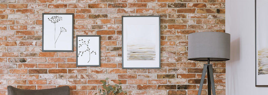 How to Hang Pictures on Brick Walls